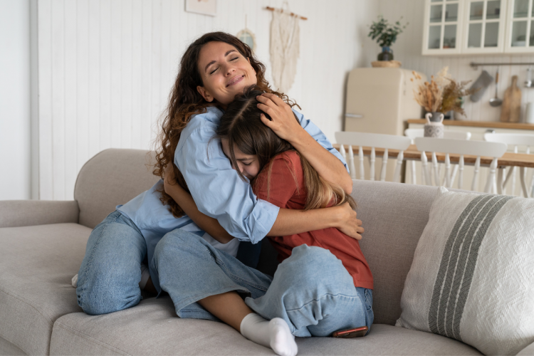 Parent comforting child during divorce